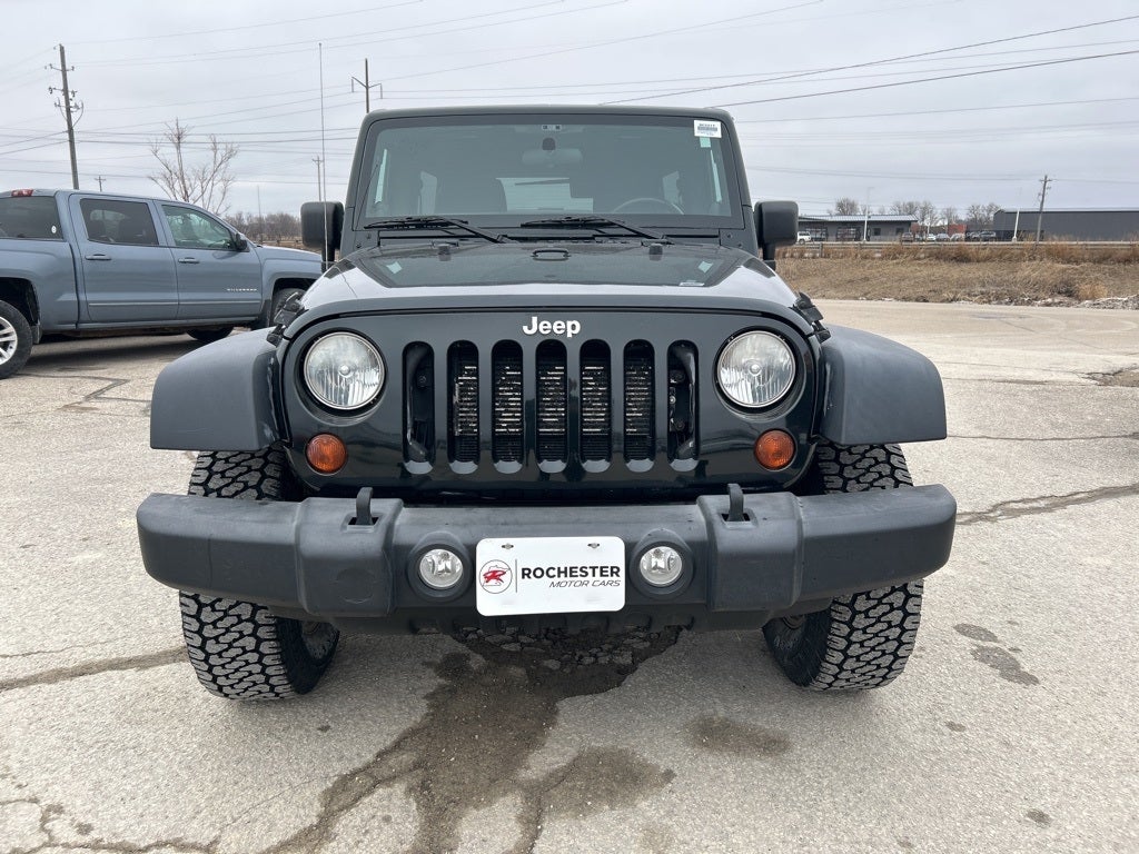 Used 2012 Jeep Wrangler Unlimited Sport with VIN 1C4BJWDG8CL257149 for sale in Rochester, Minnesota