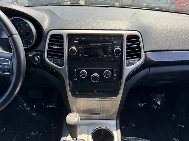 Used 2012 Jeep Grand Cherokee Laredo with VIN 1C4RJFAG7CC289285 for sale in Rochester, Minnesota
